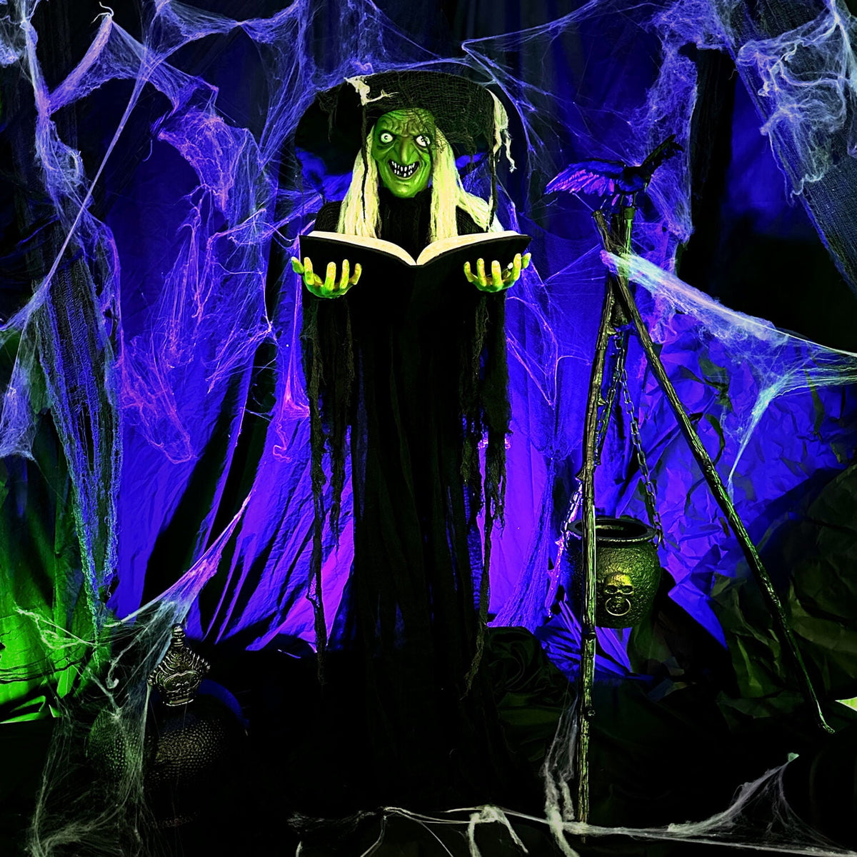 Witchwood™ 5.5 ft Poseable Witch with Spell Book, Lights and Sound, Indoor/Covered Outdoor Halloween Decoration, HHWITCH-9FLS