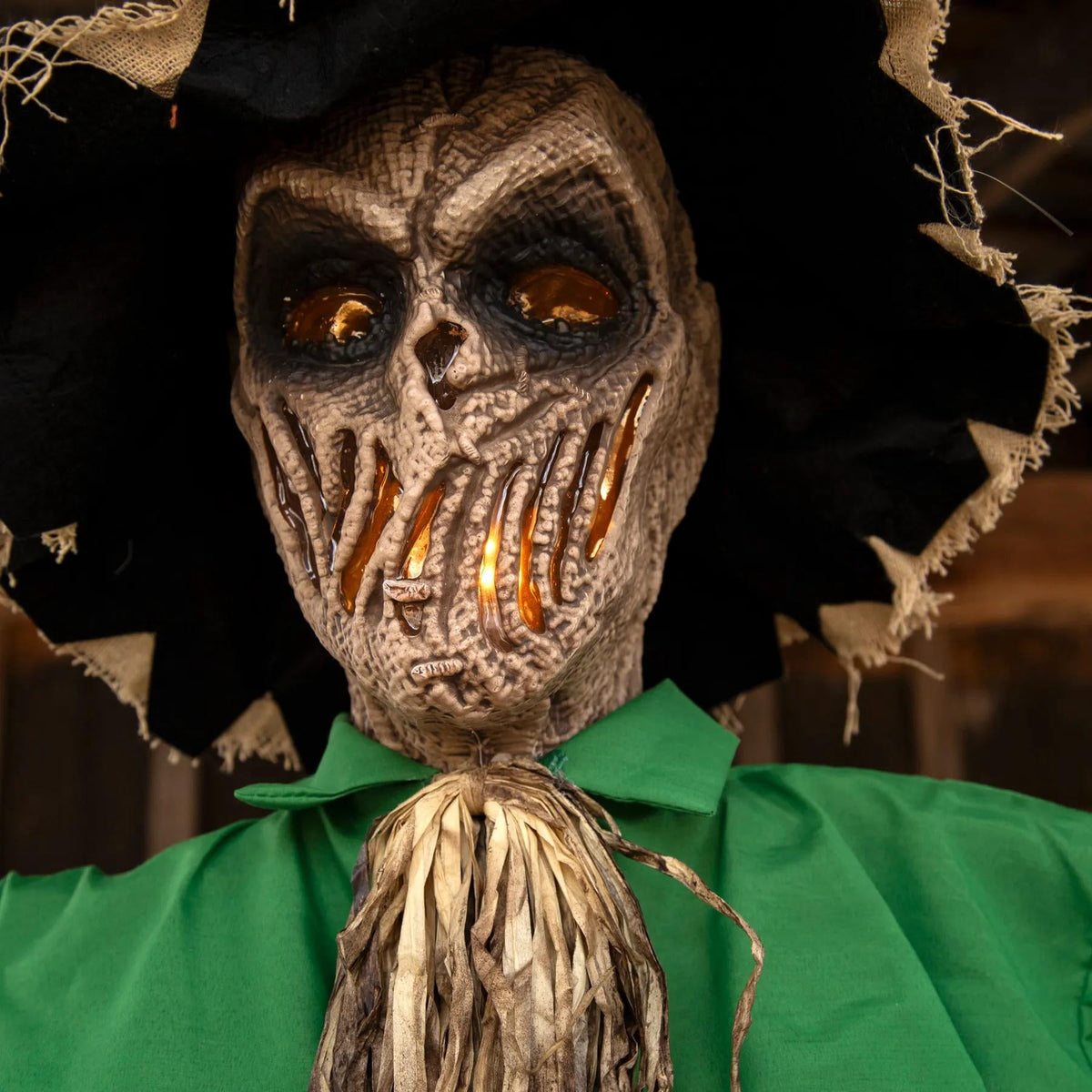 Witchwood™ 6 Ft. Light-Up Hanging Animated Scarecrow Halloween Decoration