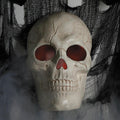 Witchwood™ 19 3/4" Giant Light-Up Plastic Skull Animated Prop Halloween Decoration