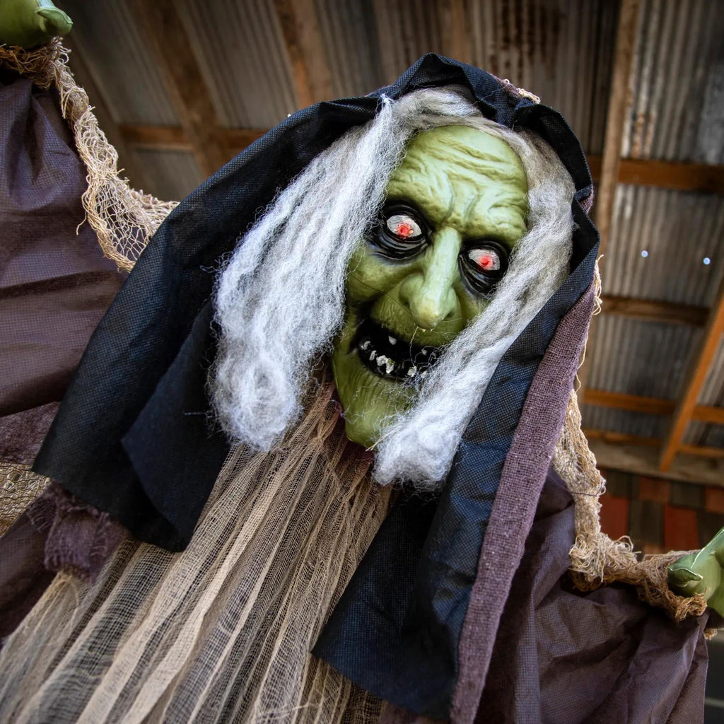 Witchwood™ 43 1/4" x 4 Ft. 9" Light-Up Hunchback Witch Standing Halloween Decoration