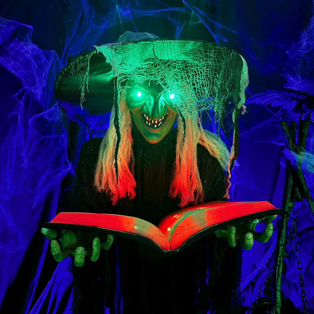 Witchwood™ 5.5 ft Poseable Witch with Spell Book, Lights and Sound, Indoor/Covered Outdoor Halloween Decoration, HHWITCH-9FLS