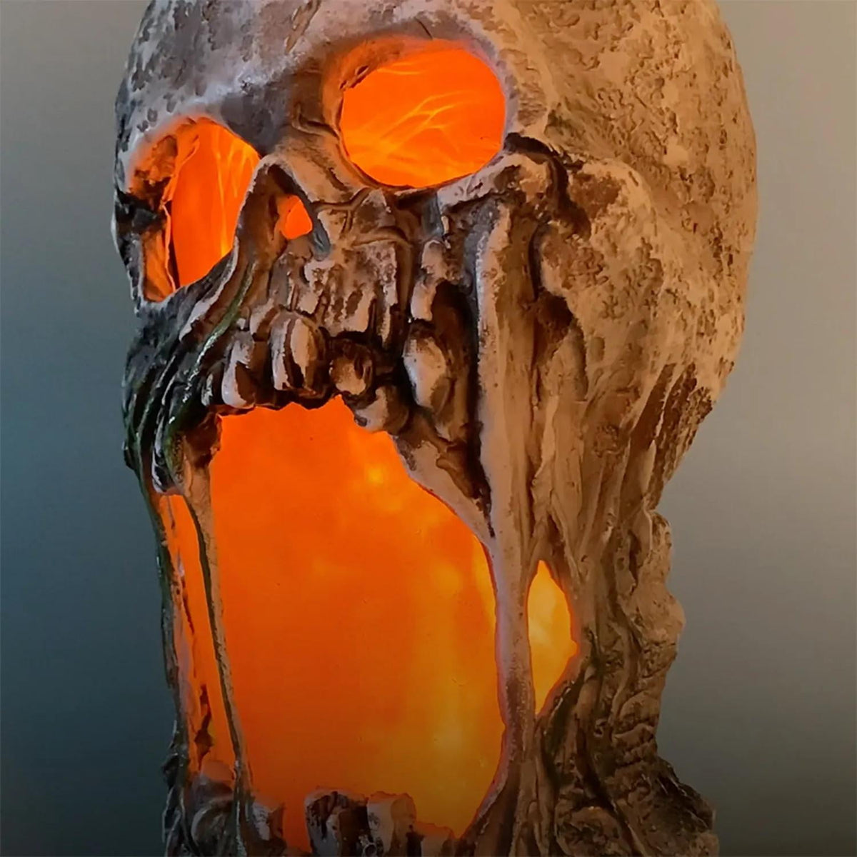 Witchwood™ Tekky Toys 12" Light-Up Animated Flaming Rotted Skull Halloween Decoration