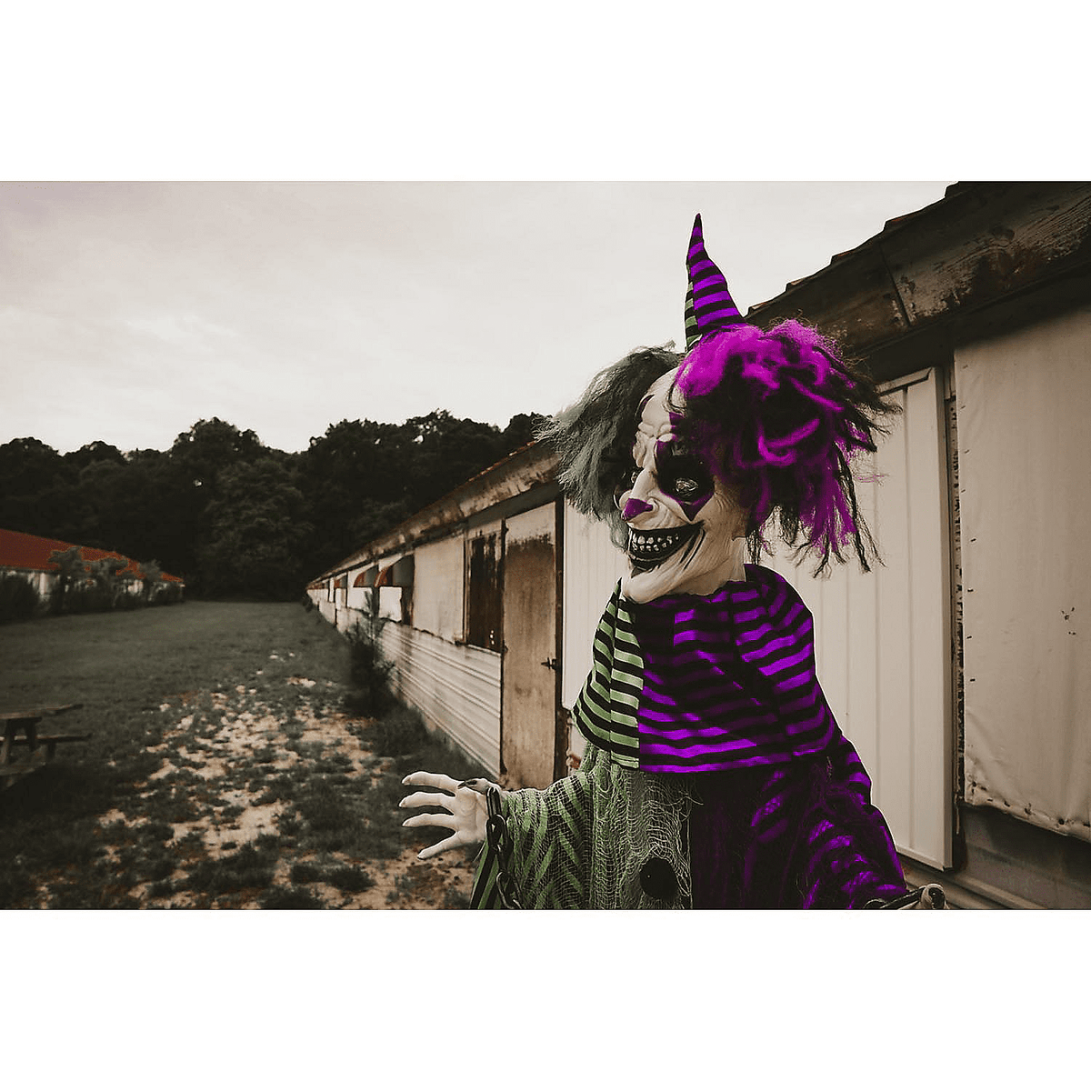 Witchwood™ Fun Express Animated Standing Scary Clown Halloween Decoration