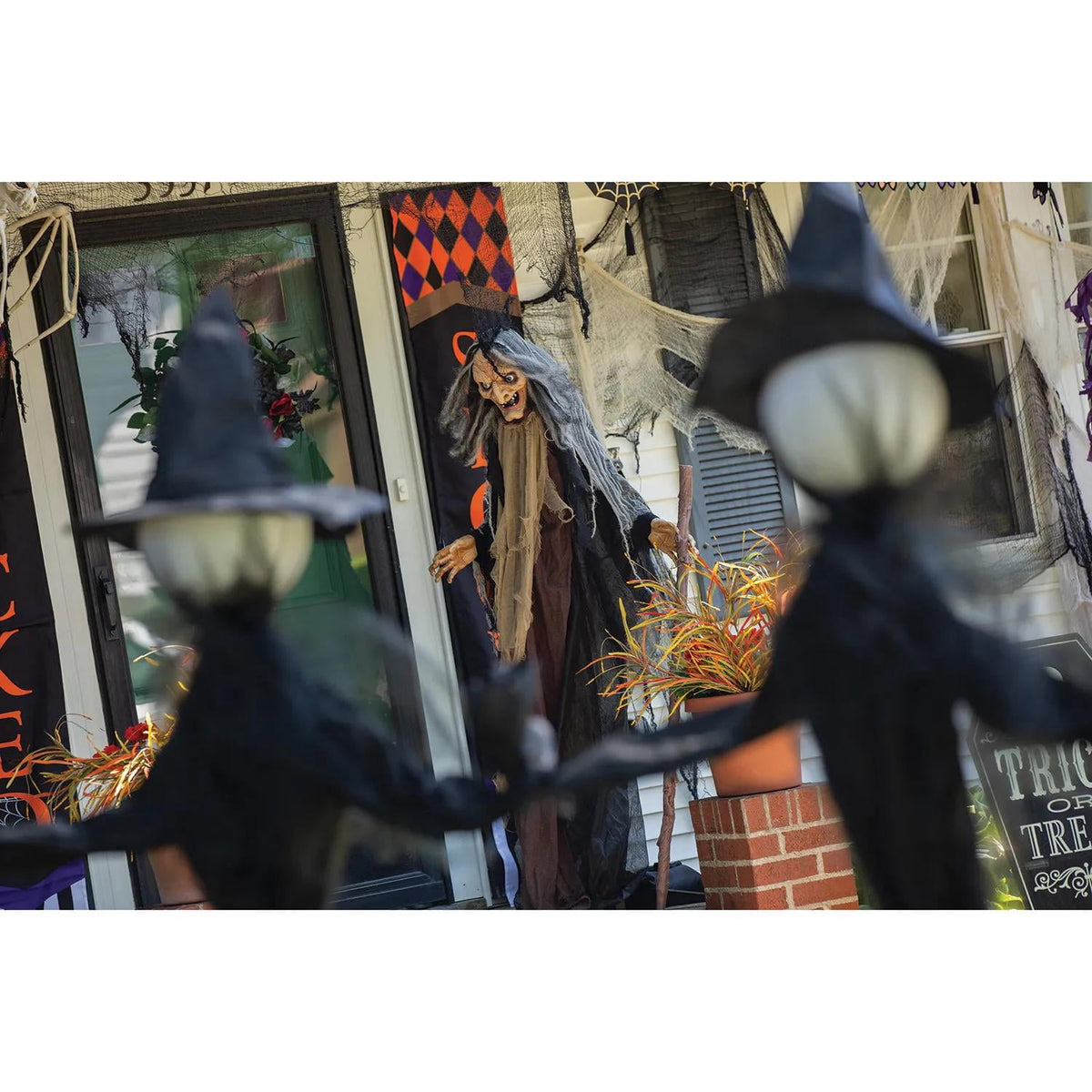 Witchwood™ Fun Express 5-Foot Animated Standing Witch Creepy Halloween Decoration