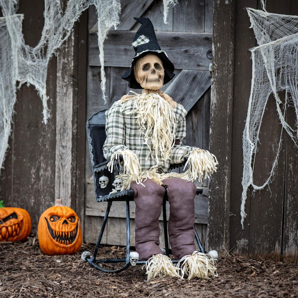 Witchwood™ 29 1/4" x 47 1/4" Animated Scarecrow on Rocking Chair Halloween Decoration