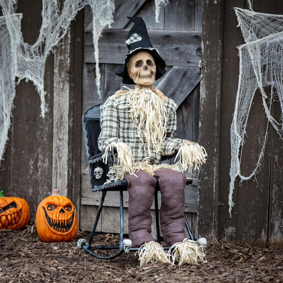 Witchwood™ 29 1/4" x 47 1/4" Animated Scarecrow on Rocking Chair Halloween Decoration