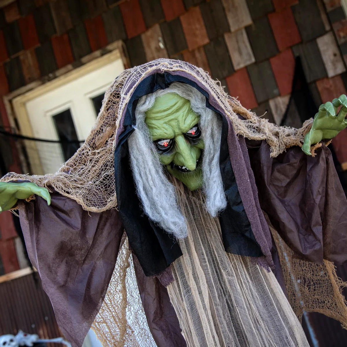 Witchwood™ 43 1/4" x 4 Ft. 9" Light-Up Hunchback Witch Standing Halloween Decoration